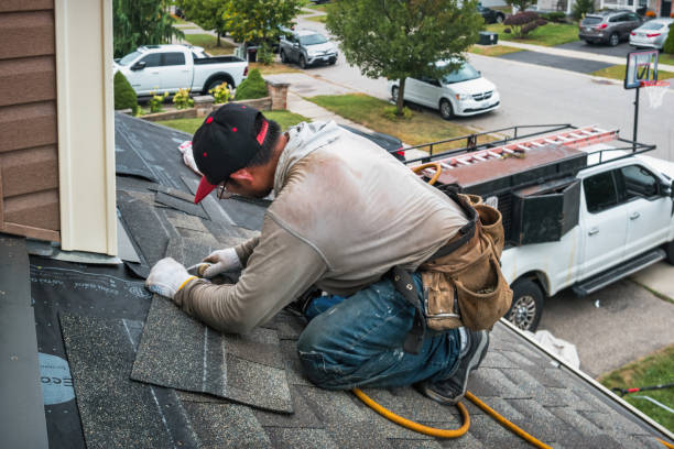 Professional Roof Replacement technician working in Lawrence, MS